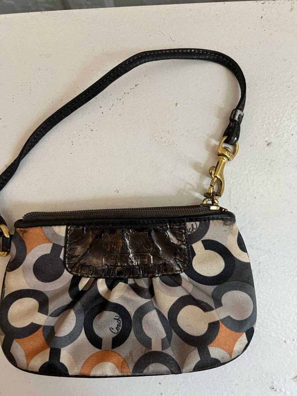 Coach Small Signature Circle Print Wristlet in Black, Tan and Gray